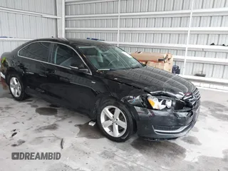 2014 Volkswagen Passat S with VIN 1VWAT7A37EC035831, listed as a IAAI auction lot 42648263 with 118,081 mi miles and . Bid and sale history available at DreamBid. Image 1.