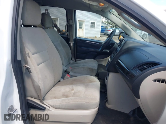 2017 Dodge Grand Caravan SE with VIN 2C7WDGBG3HR828825, listed as a IAAI auction lot 42048885 with 231,690 mi miles and . Bid and sale history available at DreamBid. Image 5.