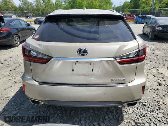 2019 Lexus RX 350 z VIN JTJBZMCA5K2041190, wystawiony jako Copart lot #52142425 z przebiegiem 35 741 mil mil oraz Szkody całkowita. Historia ofert i sprzedaży dostępna na DreamBid. Obrazek 6.
