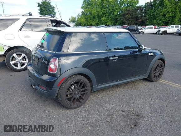 2013 MINI Hardtop S with VIN WMWSV3C53DT477574, listed as a IAAI auction lot 42385383 with 81,312 mi miles and . Bid and sale history available at DreamBid. Image 4.