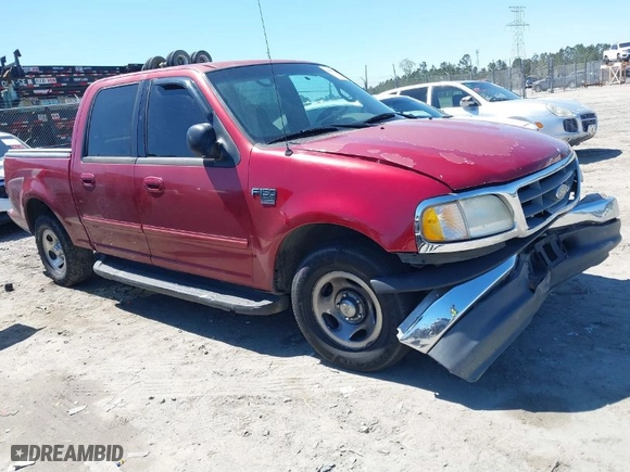 2001 Ford F-150 SuperCrew XLT with VIN 1FTRW07L11KE20412, listed as a IAAI auction lot 41877980 with 1 mi miles. Bid and sale history available at carsss.com. Image 1.