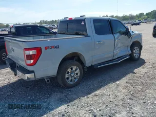 2023 Ford F-150 XL with VIN 1FTFW1E80PFB58830, listed as a IAAI auction lot 41823584 with 35,536 mi miles. Bid and sale history available at carsss.com. Image 4.