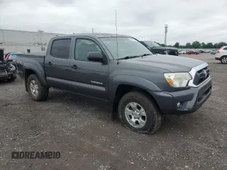 2015 Toyota Tacoma with VIN 3TMLU4EN6FM203591, listed as a Copart auction lot 58518185 with 149,729 mi miles and Salvage title. Bid and sale history available at DreamBid. Image 4.