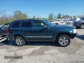 2006 Jeep Grand Cherokee Limited with VIN 1J4HR58NX6C114451, listed as a IAAI auction lot 42093832 with 264,418 mi miles. Bid and sale history available at carsss.com. Image 14.