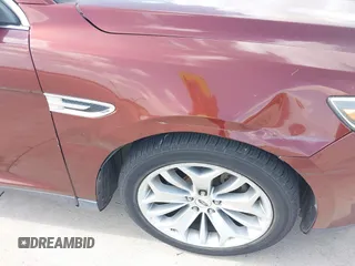 2015 Ford Taurus Limited with VIN 1FAHP2F85FG165586, listed as a IAAI auction lot 42565514 with 183,365 mi miles and . Bid and sale history available at DreamBid. Image 6.