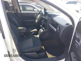 2015 Jeep Compass Sport with VIN 1C4NJCBB0FD122085, listed as a IAAI auction lot 41599772 with 98,155 mi miles. Bid and sale history available at carsss.com. Image 5.