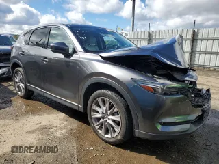 2020 Mazda CX-5 Grand Touring with VIN JM3KFBDM5L0737724, listed as a Copart auction lot 49209005 with 45,031 mi miles and Salvage Title. Bid and sale history available at carsss.com. Image 4.