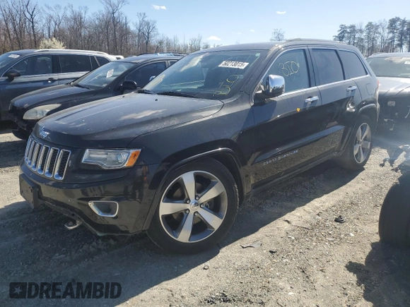 2014 Jeep Grand Cherokee Overland with VIN 1C4RJFCG1EC587458, listed as a Copart auction lot 50213015 with 124,266 mi miles and Salvage Title. Bid and sale history available at carsss.com. Image 1.