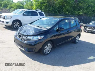 2015 Honda Fit LX with VIN 3HGGK5H51FM777364, listed as a IAAI auction lot 42297673 with 139,813 mi miles and . Bid and sale history available at DreamBid. Image 2.