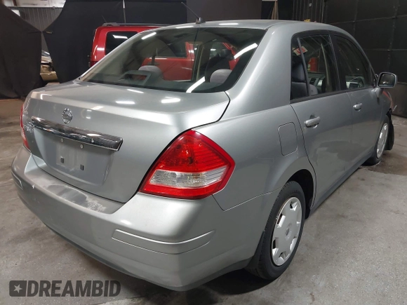 2009 Nissan Versa 1.8 S with VIN 3N1BC11EX9L396439, listed as a IAAI auction lot 42049665 with 49,617 mi miles. Bid and sale history available at carsss.com. Image 4.
