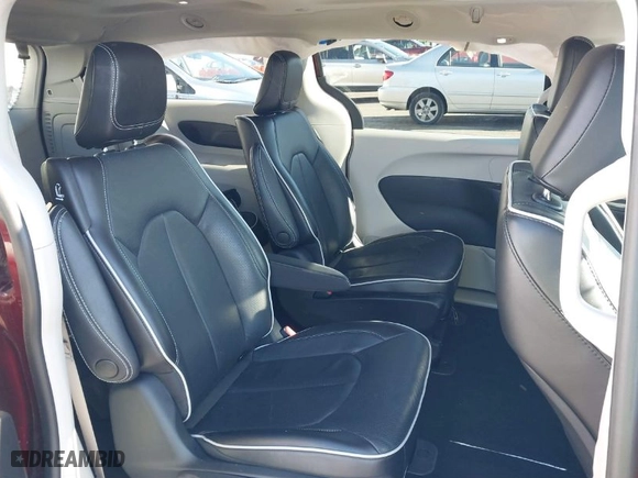 2023 Chrysler Pacifica Hybrid Limited with VIN 2C4RC1S7XPR518695, listed as a IAAI auction lot 41301401 with 24,433 mi miles. Bid and sale history available at carsss.com. Image 8.
