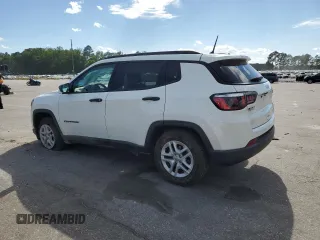 2018 Jeep Compass Sport with VIN 3C4NJCAB7JT140622, listed as a Copart auction lot 58162185 with 128,686 mi miles and Salvage title. Bid and sale history available at DreamBid. Image 2.