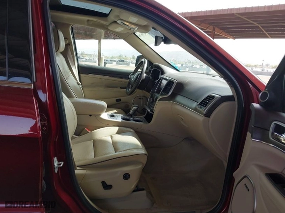 2018 Jeep Grand Cherokee Overland with VIN 1C4RJFCG1JC173042, listed as a IAAI auction lot 41705160 with 64,949 mi miles. Bid and sale history available at carsss.com. Image 5.