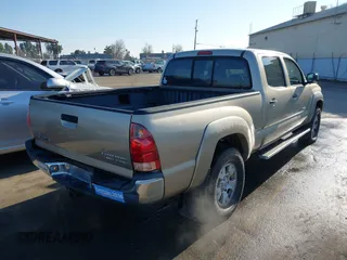 2005 Toyota Tacoma PreRunner with VIN 3TMKU72N55M003169, listed as a IAAI auction lot 41337937 with 142,474 mi miles. Bid and sale history available at carsss.com. Image 4.