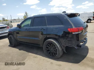 2017 Jeep Grand Cherokee Altitude with VIN 1C4RJEAG3HC952451, listed as a Copart auction lot 55658735 with 92,286 mi miles and Salvage title. Bid and sale history available at DreamBid. Image 2.