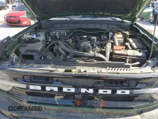 2023 Ford Bronco z VIN 1FMDE5CP1PLB73958, wystawiony jako Copart lot #58026345 z przebiegiem Nie podano mil oraz Szkoda całkowita • Salvage title. Historia ofert i sprzedaży dostępna na DreamBid. Obrazek 11.