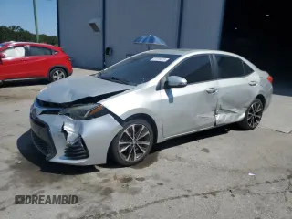 2019 Toyota Corolla L z VIN 5YFBURHE2KP886963, wystawiony jako Copart lot #57916875 z przebiegiem 94 845 mil mil oraz Szkoda całkowita • Salvage title. Historia ofert i sprzedaży dostępna na DreamBid. Obrazek 1.