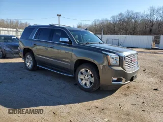 2018 GMC Yukon Denali with VIN 1GKS2CKJ6JR149752, listed as a Copart auction lot 82624404 with 137,640 mi miles and Salvage Title. Bid and sale history available at carsss.com. Image 4.