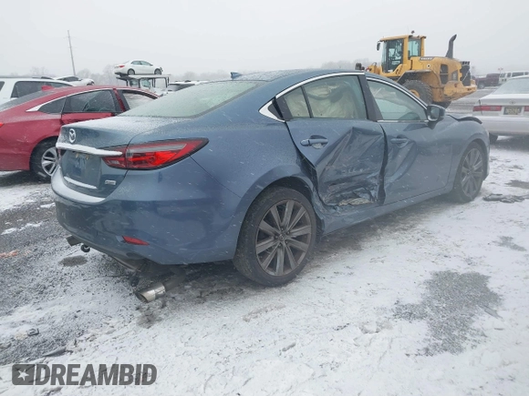 2018 Mazda 6 Grand Touring with VIN JM1GL1TY5J1330614, listed as a IAAI auction lot 41354444 with 100,744 mi miles and . Bid and sale history available at DreamBid. Image 4.