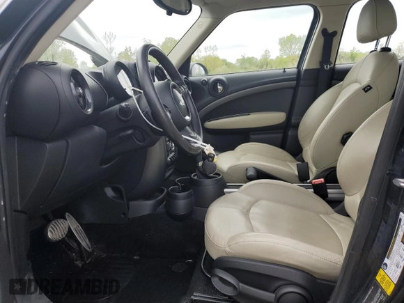 2015 MINI Countryman S with VIN WMWZC5C56FWP47995, listed as a Copart auction lot 55924945 with 46,825 mi miles and Salvage Title. Bid and sale history available at DreamBid. Image 7.
