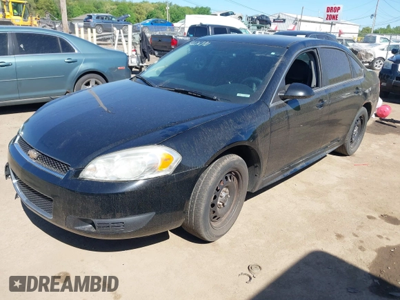 2013 Chevrolet Impala Police z VIN 2G1WD5E31D1256682, wystawiony jako IAAI lot #42276990 z przebiegiem 148 251 mil mil oraz . Historia ofert i sprzedaży dostępna na DreamBid. Obrazek 18.