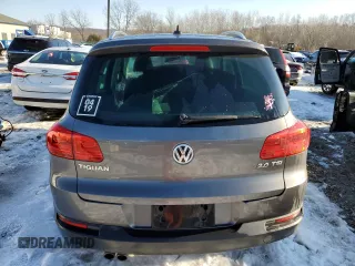2014 Volkswagen Tiguan SE z VIN WVGAV3AXXEW505398, wystawiony jako Copart lot #41682155 z przebiegiem 137 147 mil mil oraz Nie do naprawy • Non repairable. Historia ofert i sprzedaży dostępna na DreamBid. Obrazek 6.