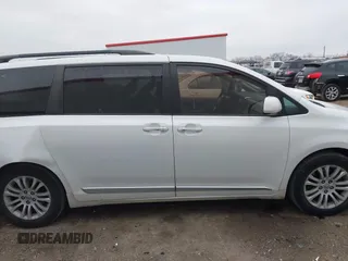 2016 Toyota Sienna XLE with VIN 5TDYK3DC2GS726677, listed as a IAAI auction lot 41609165 with 144,858 mi miles. Bid and sale history available at carsss.com. Image 13.