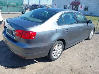 2011 Volkswagen Jetta SE with VIN 3VWBZ7AJ1BM027204, listed as a IAAI auction lot 41816349 with 152,028 mi miles and . Bid and sale history available at DreamBid. Image 4.