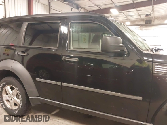 2007 Dodge Nitro SXT with VIN 1D8GU28K97W682907, listed as a IAAI auction lot 42022690 with 158,225 mi miles and . Bid and sale history available at DreamBid. Image 14.