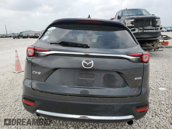2019 Mazda CX-9 Grand Touring z VIN JM3TCADY9K0300284, wystawiony jako Copart lot #51801365 z przebiegiem 53 550 mil mil oraz Szkoda całkowita • Salvage title. Historia ofert i sprzedaży dostępna na DreamBid. Obrazek 6.