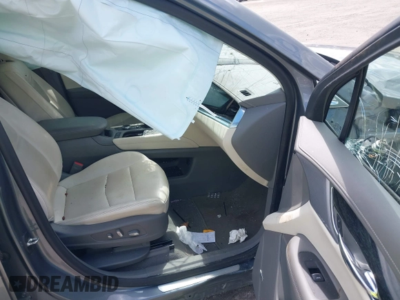 2020 Cadillac XT6 FWD Premium Luxury z VIN 1GYKPCRS9LZ129763, wystawiony jako IAAI lot #42052532 z przebiegiem 57 670 mil mil oraz . Historia ofert i sprzedaży dostępna na DreamBid. Obrazek 5.