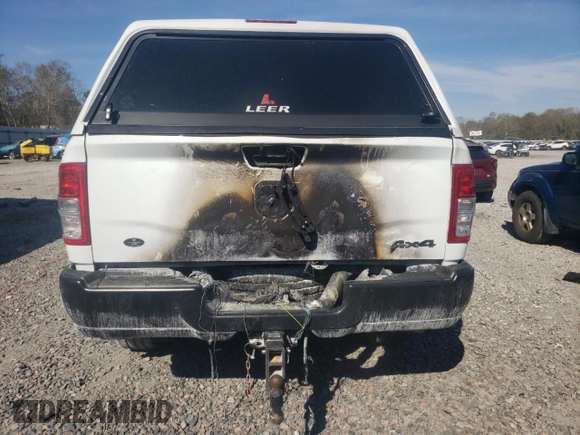 2024 Ram 2500 Tradesman with VIN 3C6MR5AJ2RG251257, listed as a Copart auction lot 50943035 with 7,128 mi miles and Salvage title. Bid and sale history available at DreamBid. Image 6.