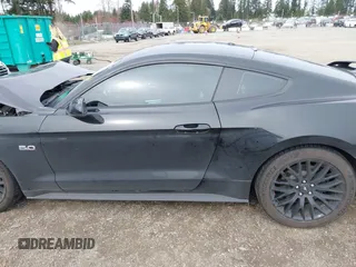 2019 Ford Mustang GT with VIN 1FA6P8CF7K5119339, listed as a IAAI auction lot 41765669 with 27,936 mi miles and . Bid and sale history available at carsss.com. Image 14.