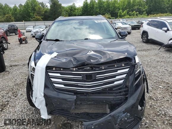 2019 Cadillac XT5 Luxury FWD с VIN 1GYKNCRS7KZ104400, выставлен на аукционе Copart как лот 58704715 с пробегом 80 676 миль миль и Списание • Salvage title. История ставок и продаж доступна на DreamBid. Изображение 5.