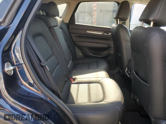 2021 Mazda CX-5 Grand Touring with VIN JM3KFADM7M0385788, listed as a Copart auction lot 88065255 with 27,787 mi miles and Salvage Title. Bid and sale history available at carsss.com. Image 11.