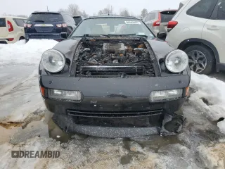 1989 Porsche 928 z VIN WP0JB0923KS861070, wystawiony jako Copart lot #88502805 z przebiegiem Nie podano mil oraz Szkody całkowita. Historia ofert i sprzedaży dostępna na DreamBid. Obrazek 5.