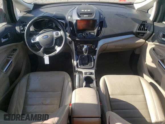 2015 Ford C-Max Energi SEL with VIN 1FADP5CUXFL115971, listed as a Copart auction lot 58272974 with 122,906 mi miles. Bid and sale history available at carsss.com. Image 8.