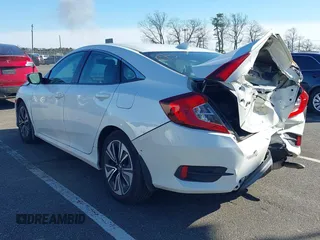 2017 Honda Civic Sedan EX-L with VIN 2HGFC1F70HH651956, listed as a IAAI auction lot 41754511 with 129,385 mi miles. Bid and sale history available at carsss.com. Image 3.