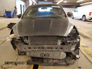 2018 Ford Focus ST with VIN 1FADP3L99JL282007, listed as a Copart auction lot 43141075 with 57,495 mi miles and Salvage Title. Bid and sale history available at DreamBid. Image 5.