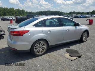 2015 Ford Focus Titanium with VIN 1FADP3J27FL267339, listed as a Copart auction lot 63395835 with 73,372 mi miles and Salvage title. Bid and sale history available at DreamBid. Image 3.