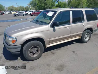 1998 Ford Explorer XL z VIN 1FMZU34E0WZA85991, wystawiony jako IAAI lot #42136398 z przebiegiem 221 454 mil mil oraz . Historia ofert i sprzedaży dostępna na DreamBid. Obrazek 2.