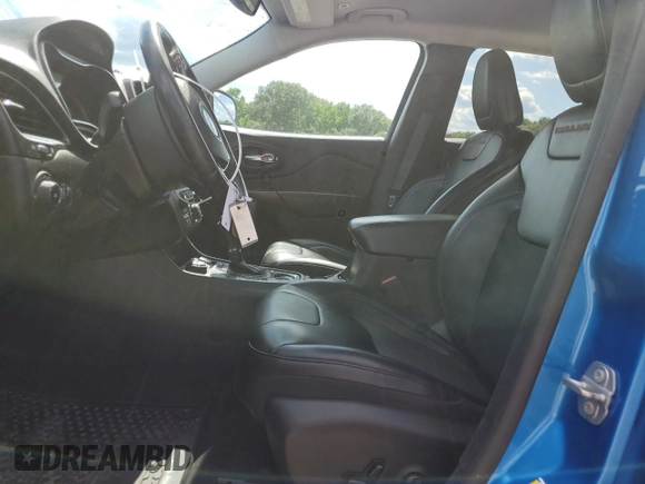 2019 Jeep Cherokee Trailhawk with VIN 1C4PJMBX0KD311114, listed as a Copart auction lot 58799765 with 60,833 mi miles and Salvage title. Bid and sale history available at DreamBid. Image 7.