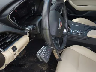 2021 Cadillac CT5 Luxury z VIN 1G6DX5RKXM0146235, wystawiony jako IAAI lot #42214676 z przebiegiem 72 847 mil mil oraz . Historia ofert i sprzedaży dostępna na DreamBid. Obrazek 11.