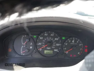 2000 Mazda Protege DX with VIN JM1BJ2227Y0240819, listed as a IAAI auction lot 41810228 with 68,650 mi miles and . Bid and sale history available at DreamBid. Image 7.