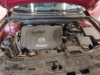 2014 Mazda 3 i Grand Touring with VIN JM1BM1W70E1202281, listed as a IAAI auction lot 41946081 with 55,536 mi miles and . Bid and sale history available at DreamBid. Image 10.