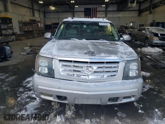 2004 Cadillac Escalade EXT z VIN 3GYEK62N34G324955, wystawiony jako Copart lot #87479764 z przebiegiem 218 127 mil mil oraz Szkody całkowita. Historia ofert i sprzedaży dostępna na DreamBid. Obrazek 5.