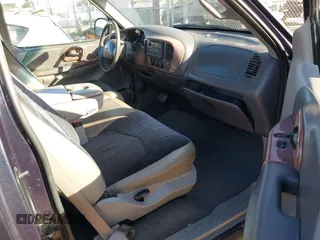 1999 Ford F-150 XL with VIN 1FTRX17L4XKA58054, listed as a IAAI auction lot 41647530 with 225,632 mi miles. Bid and sale history available at carsss.com. Image 5.
