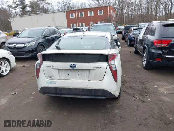 2018 Toyota Prius Two with VIN JTDKARFU8J3059124, listed as a IAAI auction lot 41709364 with 79,982 mi miles. Bid and sale history available at carsss.com. Image 17.