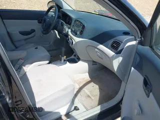 2006 Hyundai Accent GLS with VIN KMHCN46C36U018237, listed as a IAAI auction lot 41916524 with 92,427 mi miles. Bid and sale history available at carsss.com. Image 5.