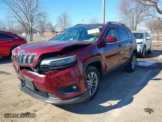 2019 Jeep Cherokee Latitude Plus with VIN 1C4PJMLX3KD310893, listed as a IAAI auction lot 41630484 with 80,807 mi miles. Bid and sale history available at carsss.com. Image 2.
